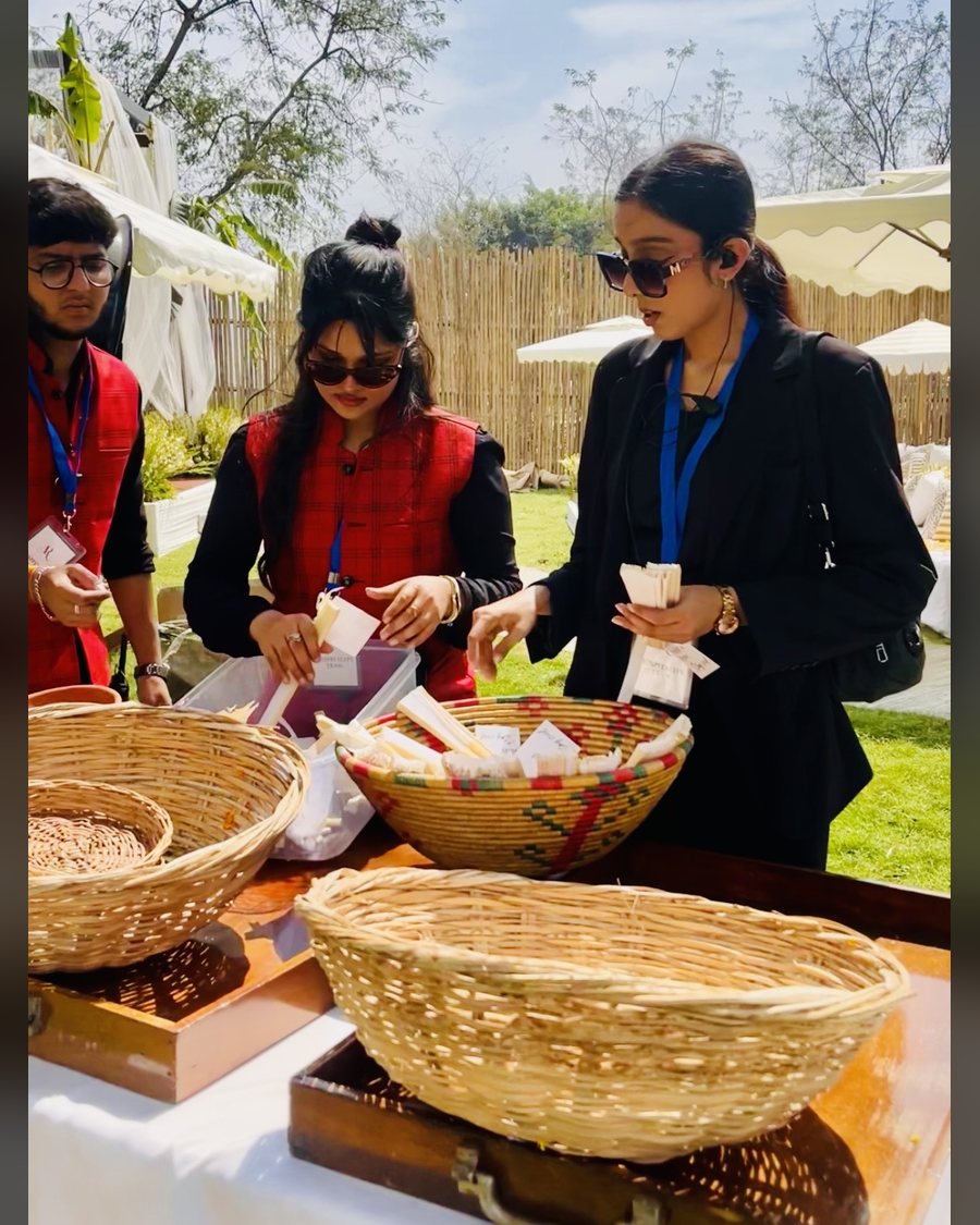 Wedding team preparing guest favours at a daytime function
