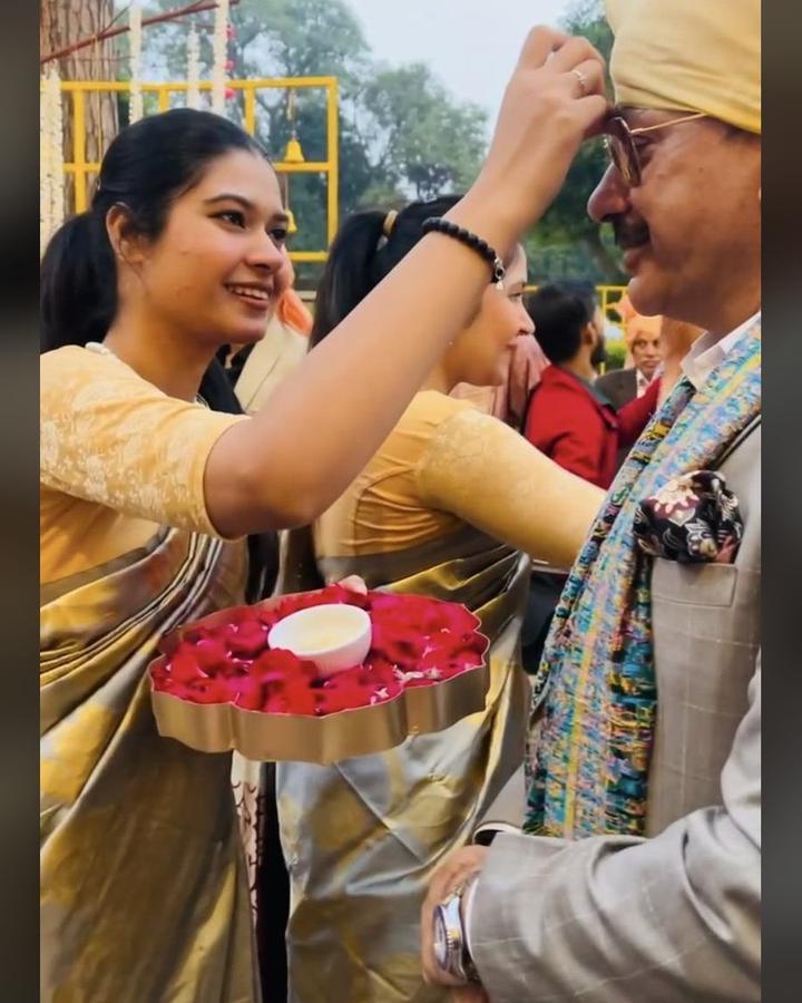 Tilak welcome ritual performed for arriving wedding guests